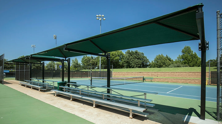 green Cantilever over tennis court benches